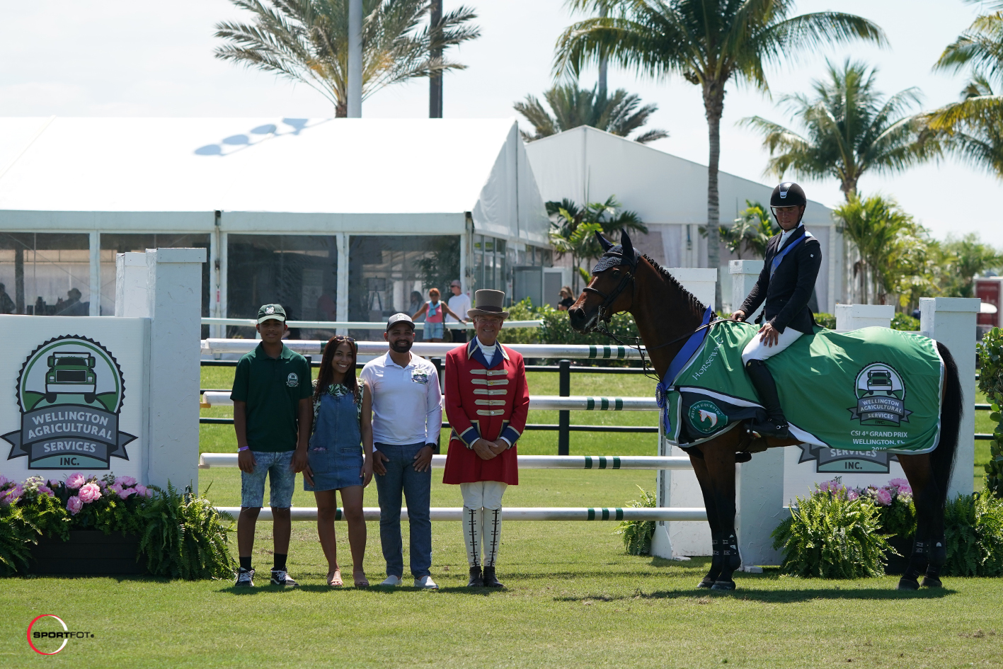 Emil Hallundbaek and Chalisco in their winning presentation with Xavier, Abigail, and Jose Gomez of Wellington Agricultural Services with ringmaster Steve Rector. Photo © Sportfot