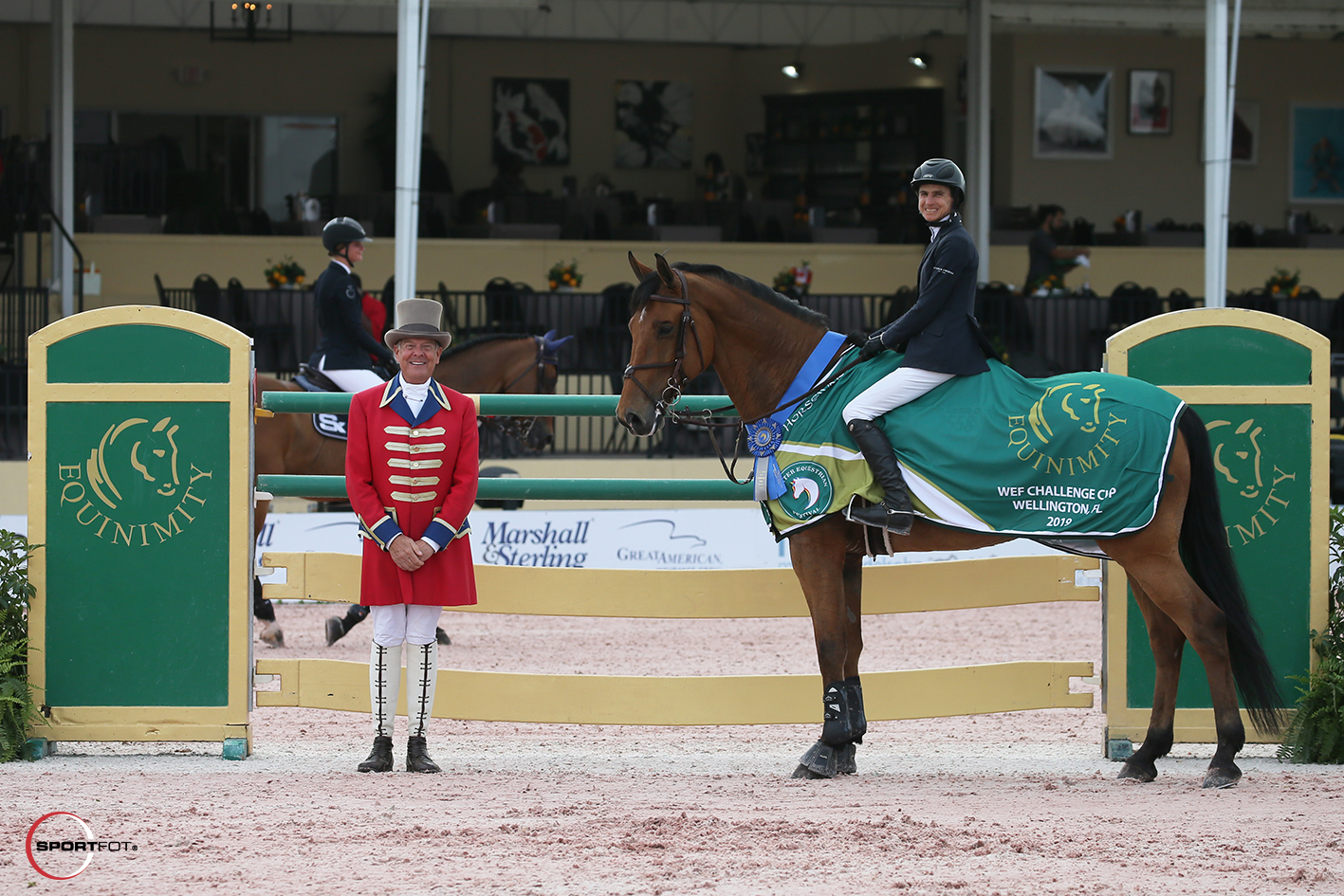 Ringmaster Steve Rector with Laura Chapot. Photo © Sporfot