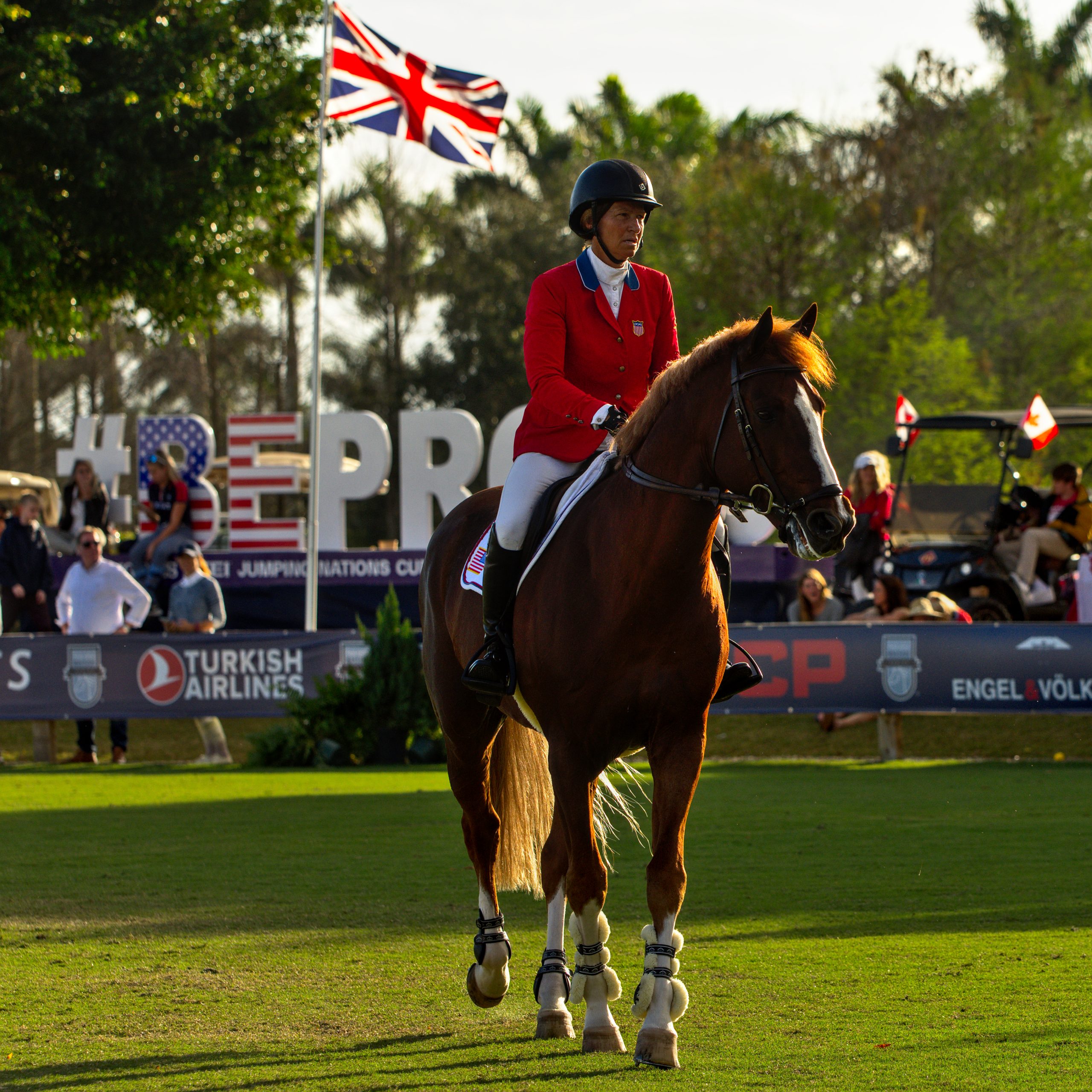 Darry Lou & Beezie Madden entering ring for final jump off in Nations Cup