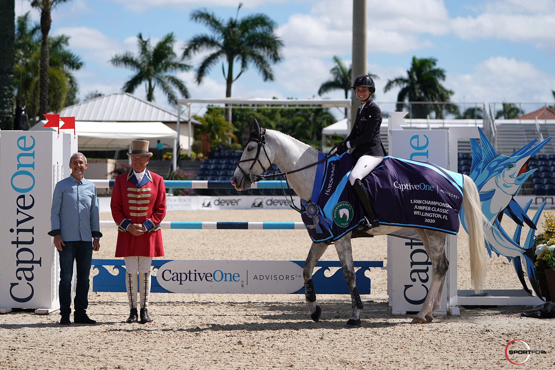 Catherine Tyree and BEC Lorenzo in their winning presentation with Vice President of Development Tim Luby of CaptiveOne Advisors and ringmaster Steve Rector. 