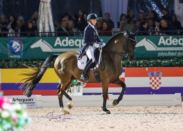 Katherine Bateson Chandler and Alcazar battle their way to victory in the FEI Grand Prix Freestyle CDI5*, presented by CaptiveOne Advisors, during “Friday Night Stars” on 76.105%.