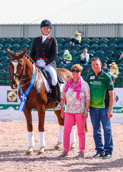 Croatia’s Karen Pavicic and the Totilas son Totem with judge Elizabeth (Sissy) Max-Theurer and Allyn Mann of title sponsor Adequan®.