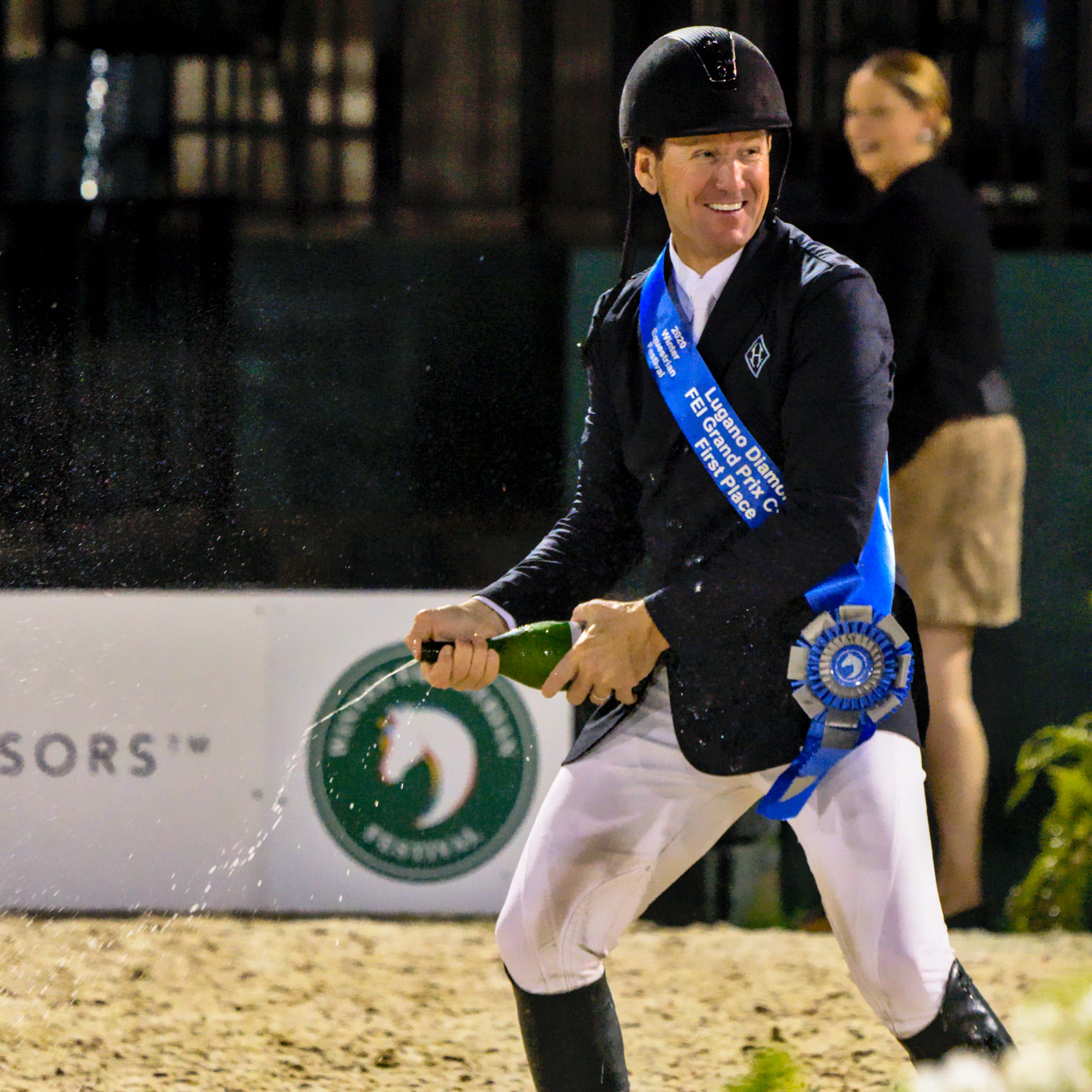 McLain Ward showers his fellow riders with champagne after awards ceremony. 