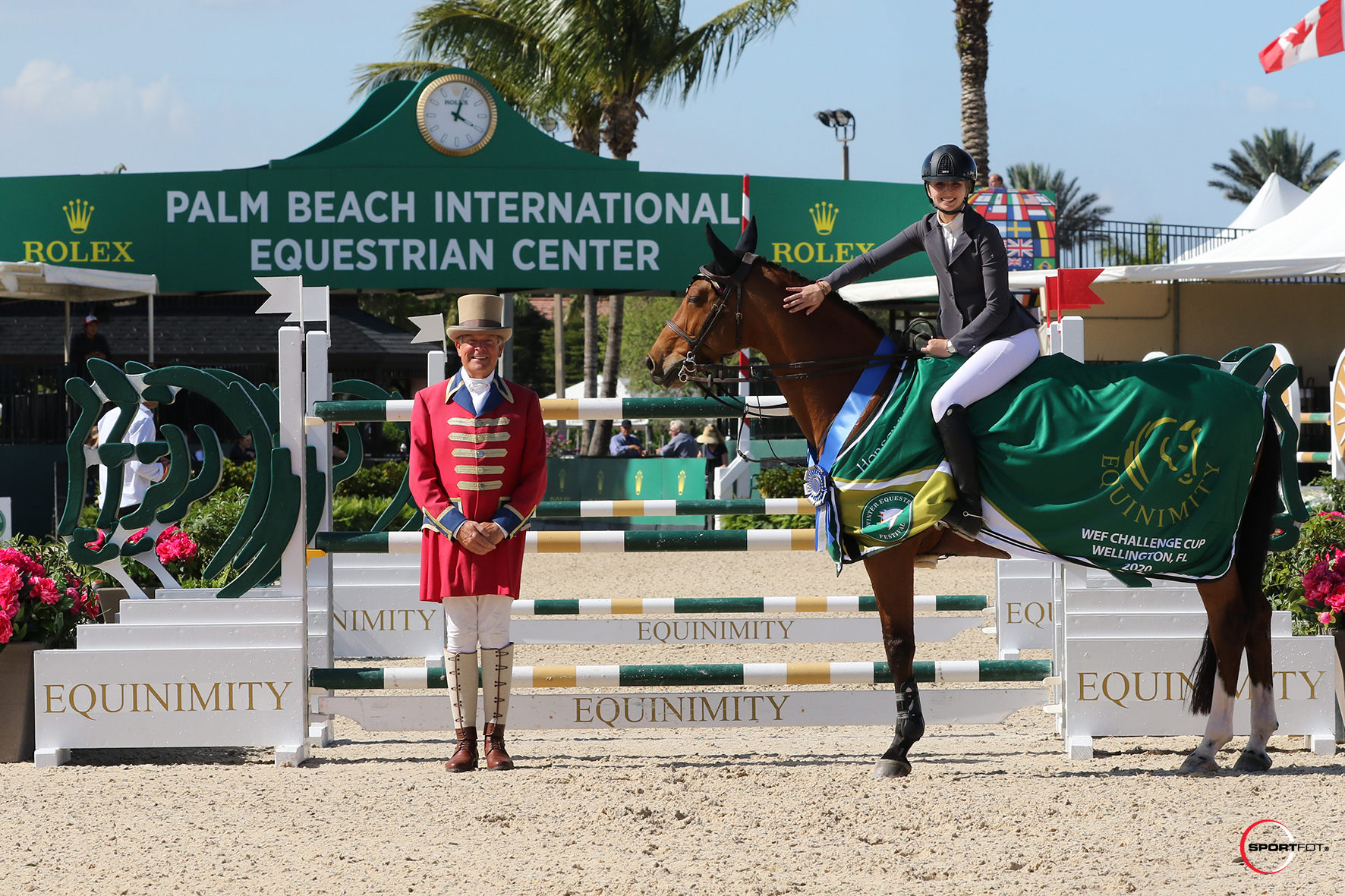 Abigail McArdle and Victorio 5 in their winning presentation photo with ringmaster Steve Rector.