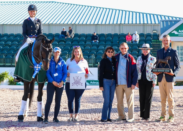 Adrienne Lyle with with with her groom, Whitney Fernandes of Adequan®, Mary Ann and Walter McPhail of Palm Beach Derby, judge Irina Maknami and Walter Nef .