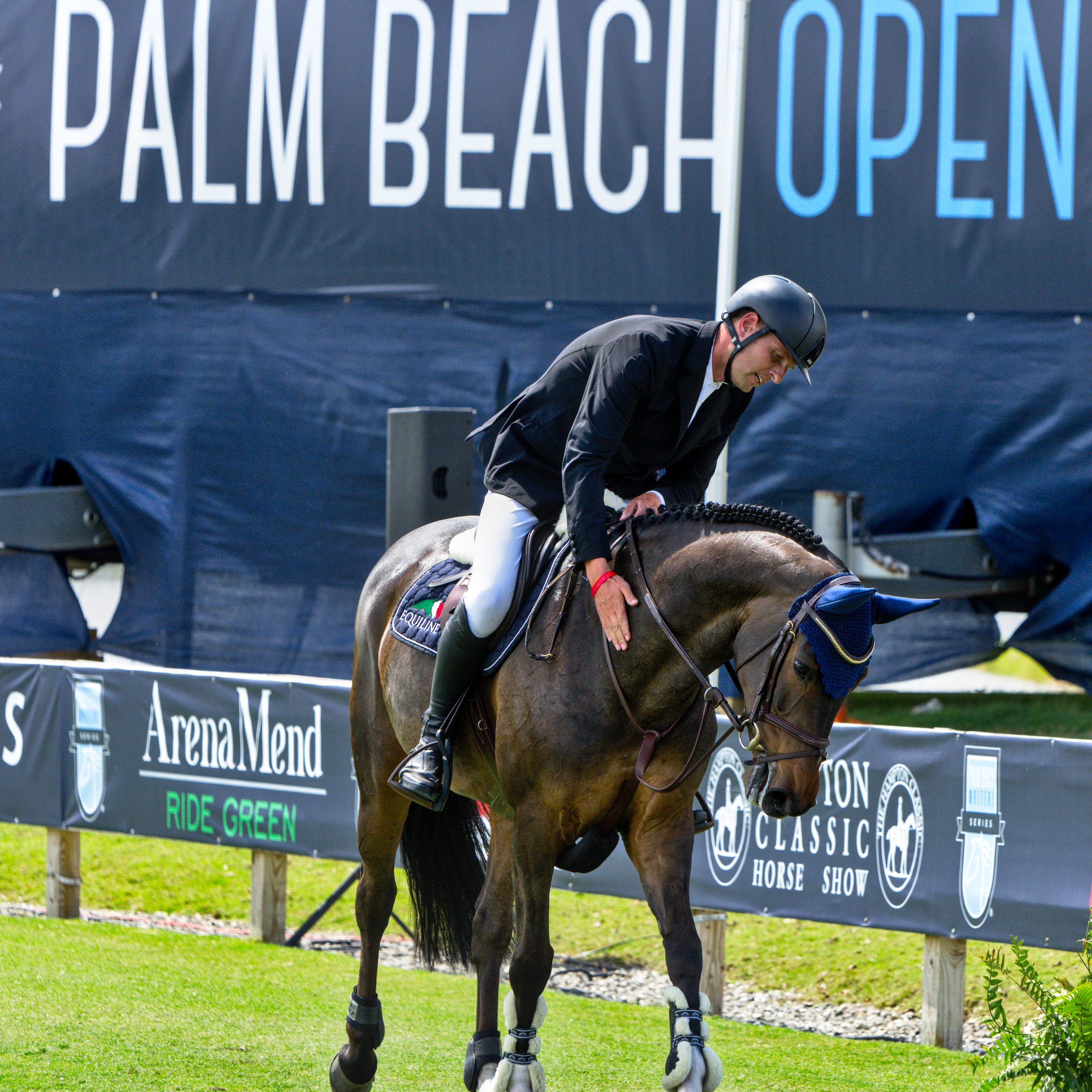 Jens Baackmann gives Caprice praise after jumping 2nd clear round.
     Photo © @showjumping247 