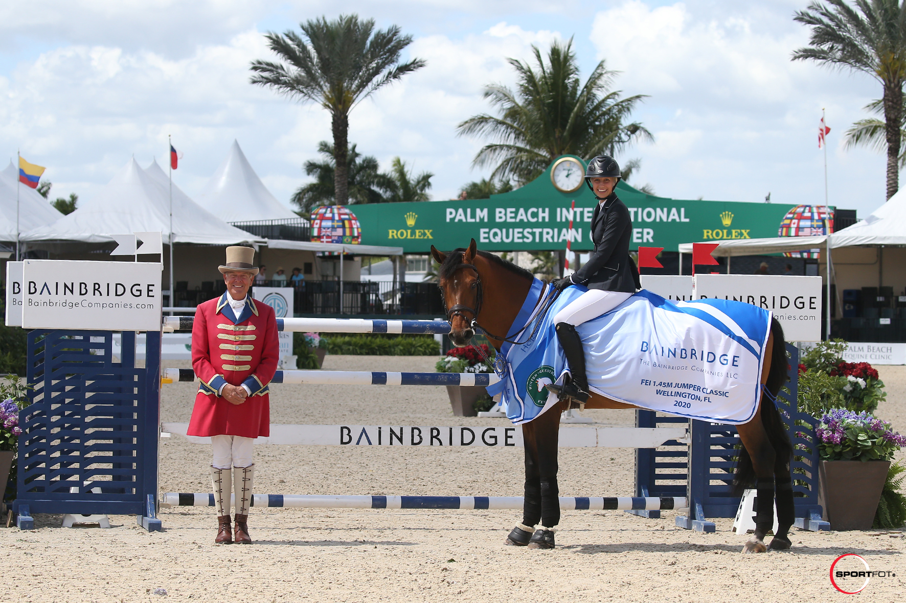 Natalie Dean and Ceitasi in their winning presentation with ringmaster Steve Rector. 