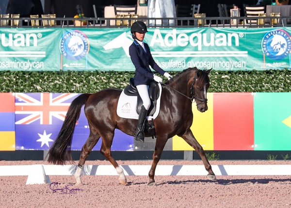 Scarlett Hansen is the pony division champion on the home-bred Reve De Glatigny at their final show together. ©SusanStickle.com