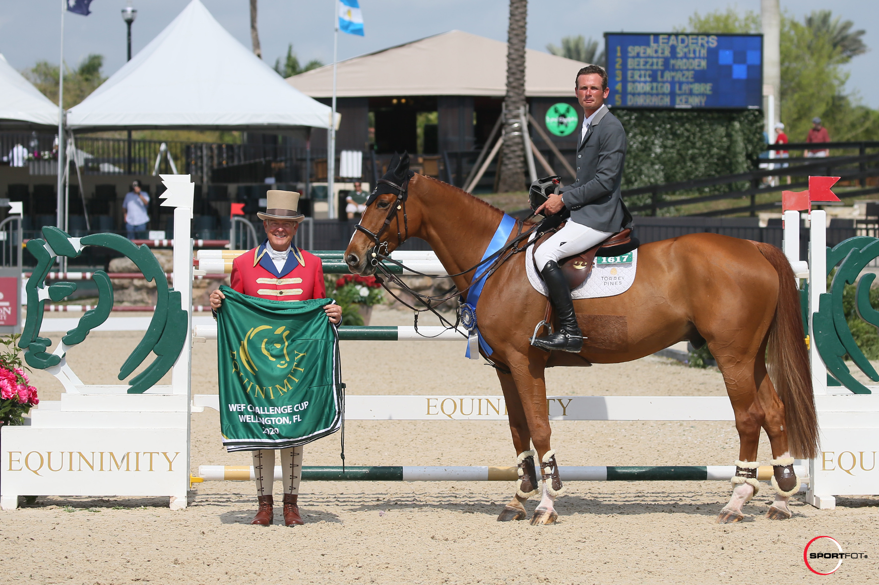 Spencer Smith and Theodore Mancais in their winning presentation with ringmaster Steve Rector. 