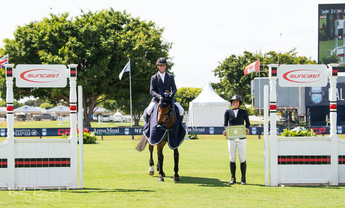 McLain Ward and Catoki are presented as winners of the $36,600 CSI5* Suncast Welcome Stake alongside Lauren Tisbo, representing Suncast Commercial. Photo by Kathy Russell Photography.