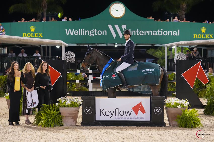 
          Rene Dittmer & Corsica presented as winners by Nicole Dones, Owner Keyflow USA, Kathy Serio CEO, Keyflow USA, and Bobette Martin, Business Development Manager, Ocala in the $226,000 Holiday & Horses CSI4* Grand Prix, Sponsored by Keyflow Feeds USA © Sportfot
        