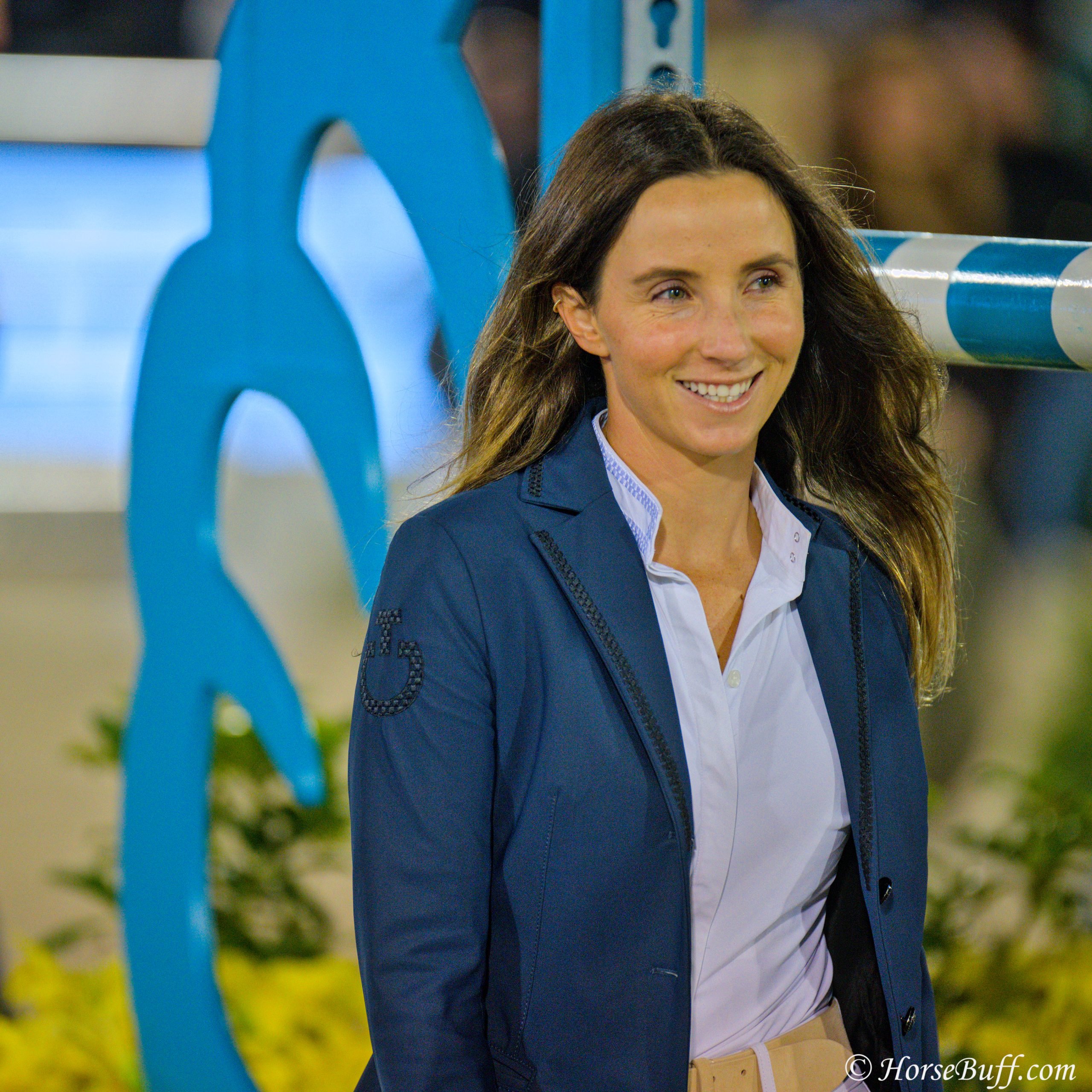 The absolutely amazing Adrienne Sternlicht lights up the entire venue with her smile while walking the course! ©HorseBuff.com