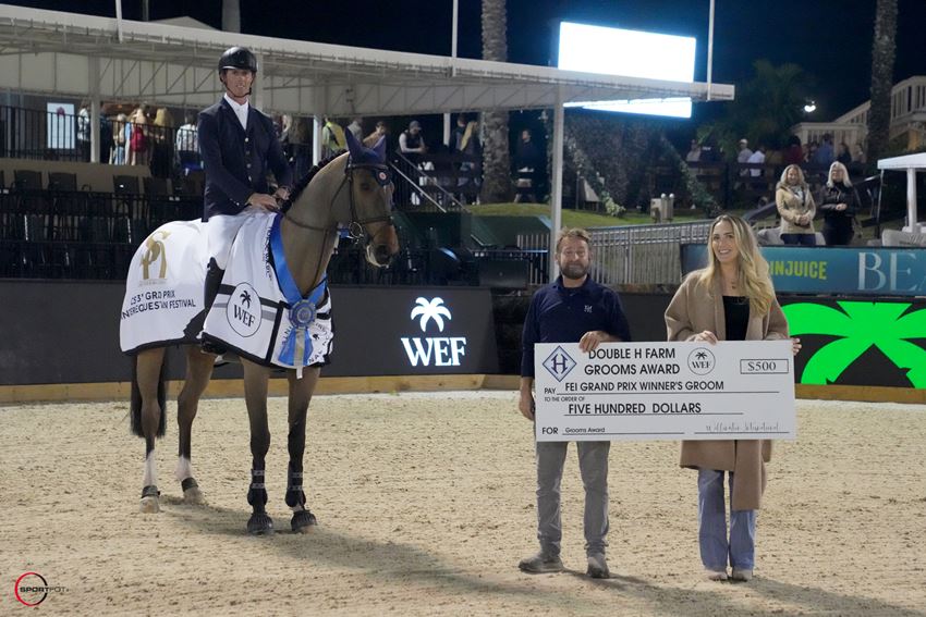 
          Derren Lake was honored with the $500 Grooms Award, presented by Double H Farm, by Caitlin Creel. Photo © Sportfot